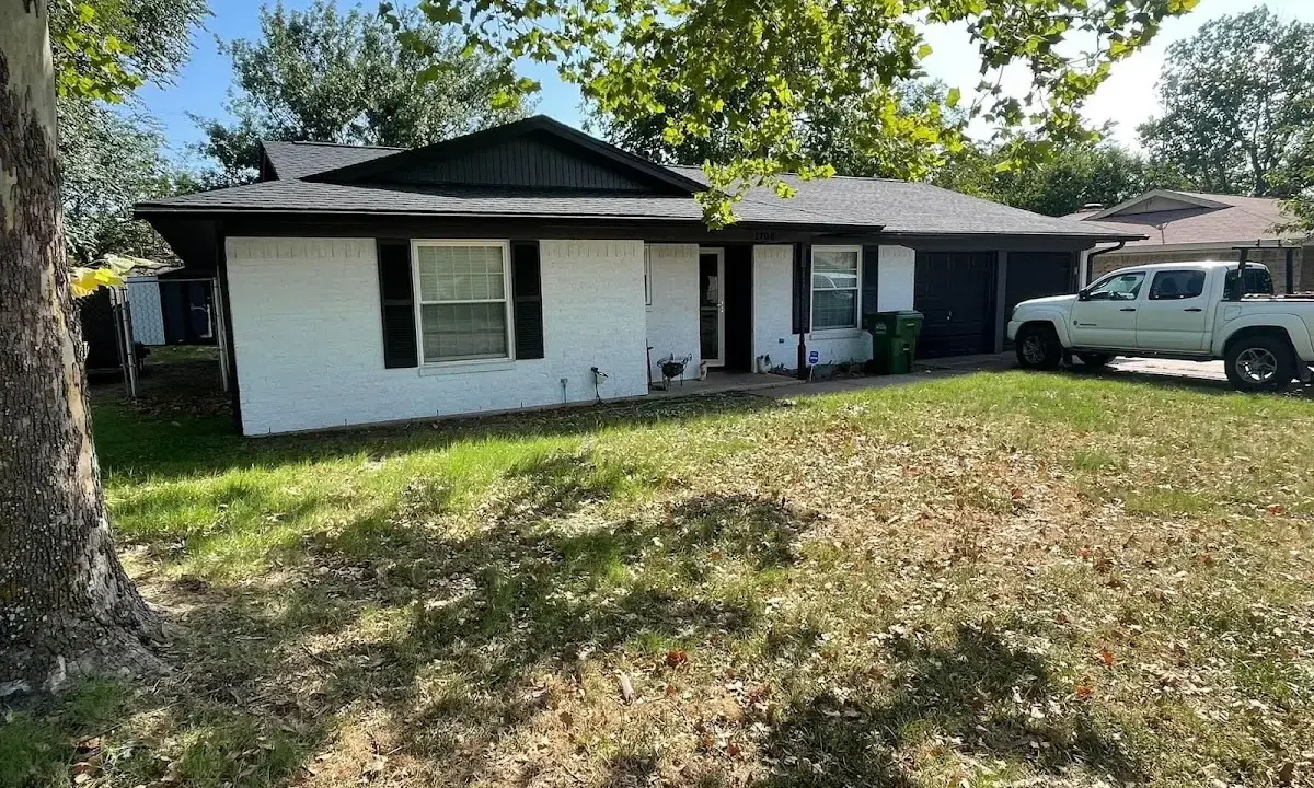 Professional roofing crew working on a residential roof in Vernal
